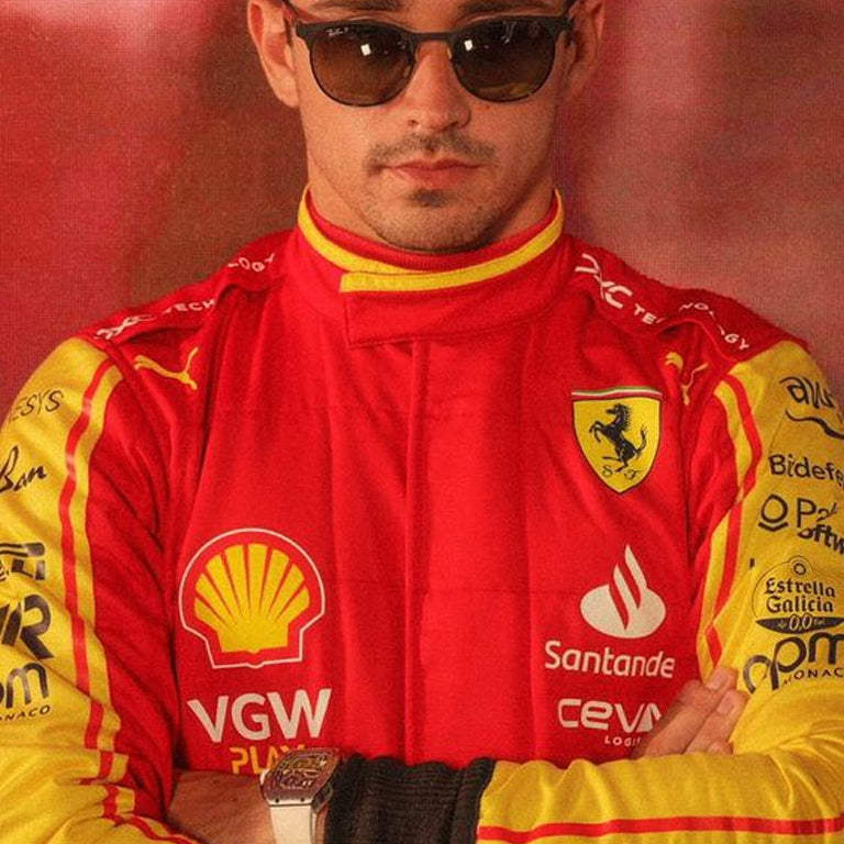 "Charles Leclerc wearing the 2023 Monza GP Ferrari F1 Race Replica Suit, premium Formula 1 racing apparel with authentic Ferrari-inspired design for motorsport enthusiasts and collectors."