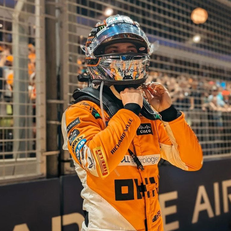 McLaren F1 night race racing suit featuring authentic Singapore Grand Prix styling.