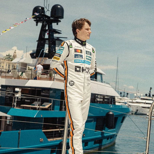 Oscar Piastri 2025 Monaco GP McLaren Formula 1 racing suit inspired by the Monte Carlo street circuit.