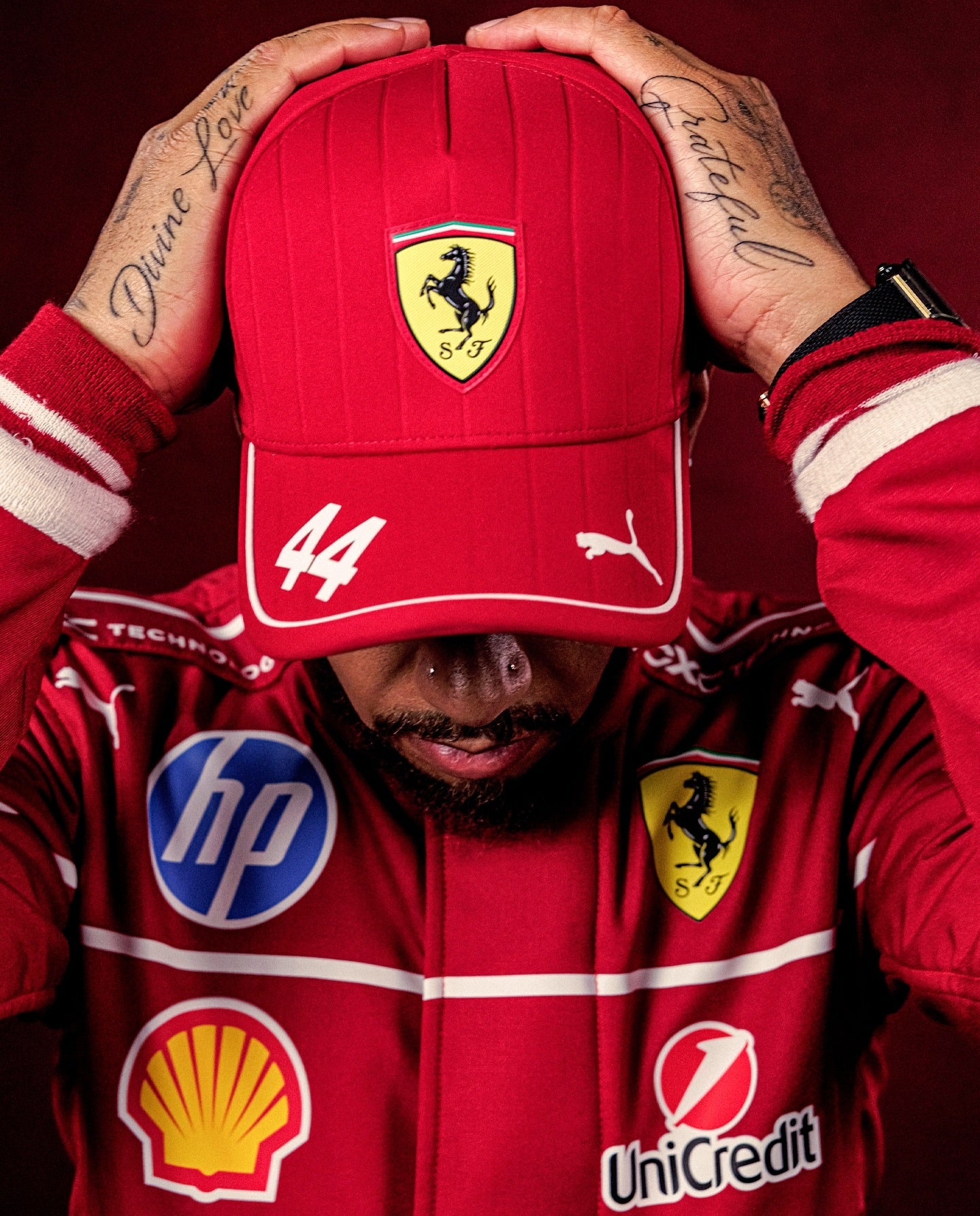 Lewis Hamilton Ferrari F1 suit
